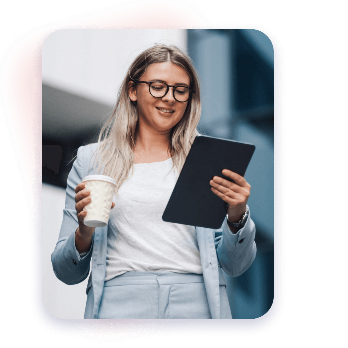 woman looking at tablet